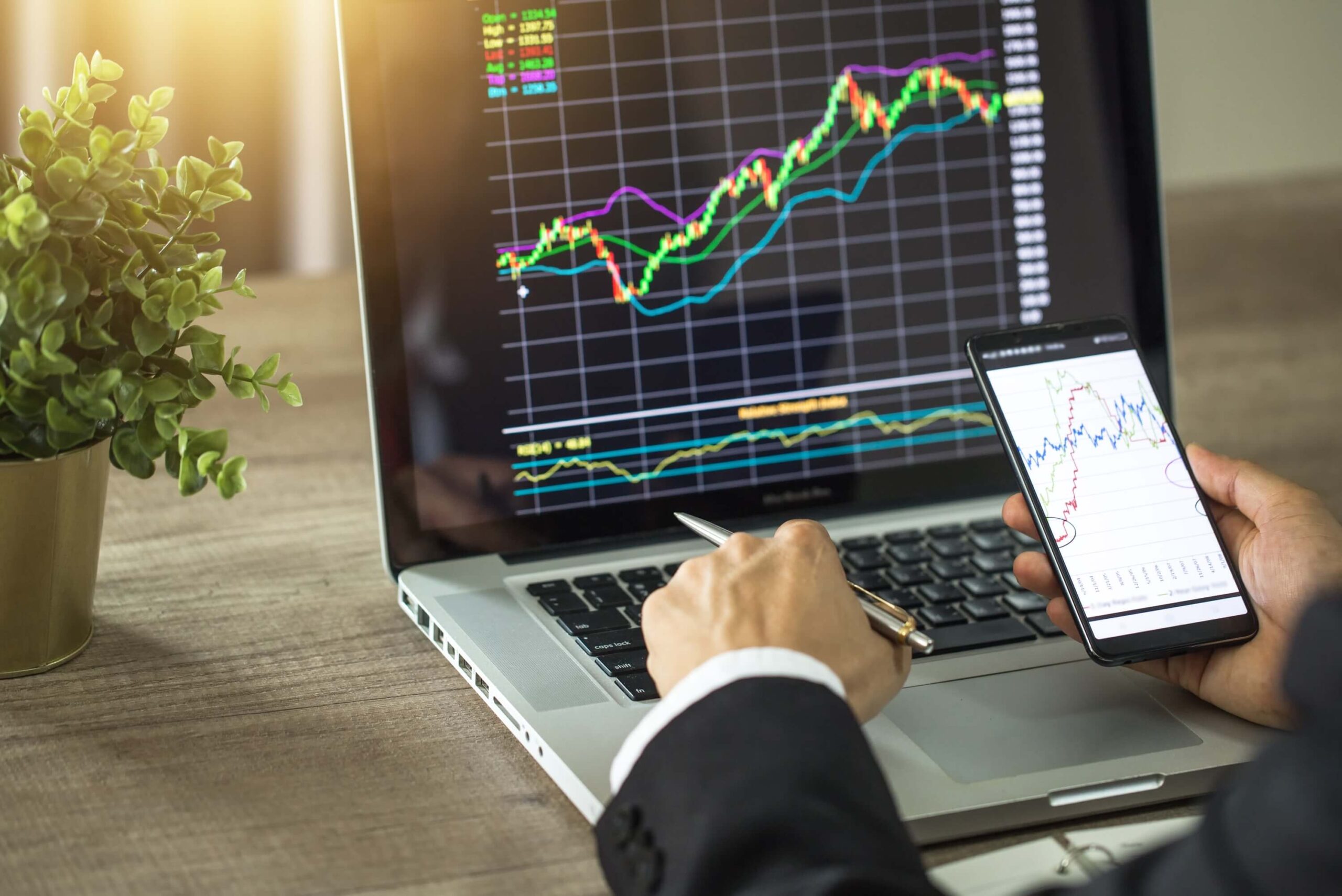 online-trading-making-trade-banker-investor-phone-laptop (1)